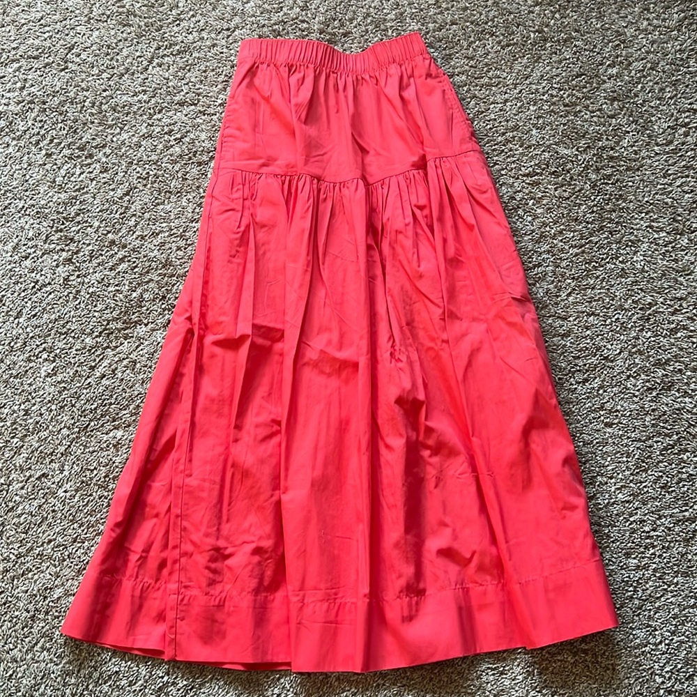 Never worn maxi skirt with pockets, elastic waist. A and F